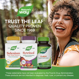 Nature's Way Sytrinol Softgels with a measuring spoon