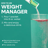 Nature's Way Weight Manager powder mixed in a glass of water