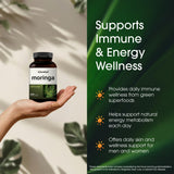 NatureBell Moringa Extract Capsules on a wooden table