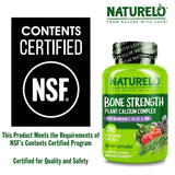NATURELO Bone Strength supplement on a wooden table