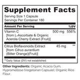 NATURELO Vitamin C Supplement displayed with oranges