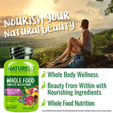 NATURELO Whole Food Multivitamin + Beauty Blend capsules in hand