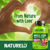 NATURELO Whole Food Multivitamins for Women on a wooden table