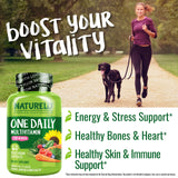 NATURELO Women's Multivitamin capsules on a wooden surface