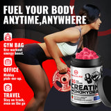 Natures Aid Creatine Monohydrate Gummies with a glass of water