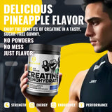 Natures Aid Creatine Monohydrate Gummies with a measuring spoon