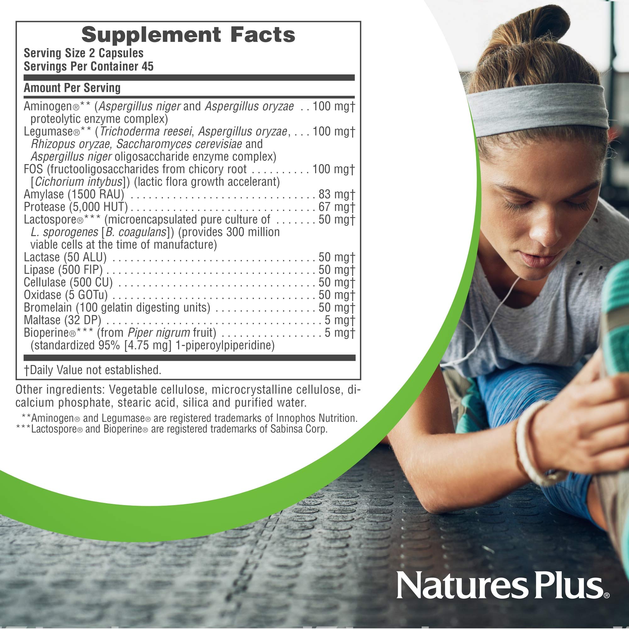 NaturesPlus Acti-Zyme Multi-Enzyme Capsules on a wooden table