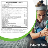 NaturesPlus Acti-Zyme Multi-Enzyme Capsules on a wooden table