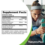 NaturesPlus Cal/Mag 500/250 Tablets on a wooden table