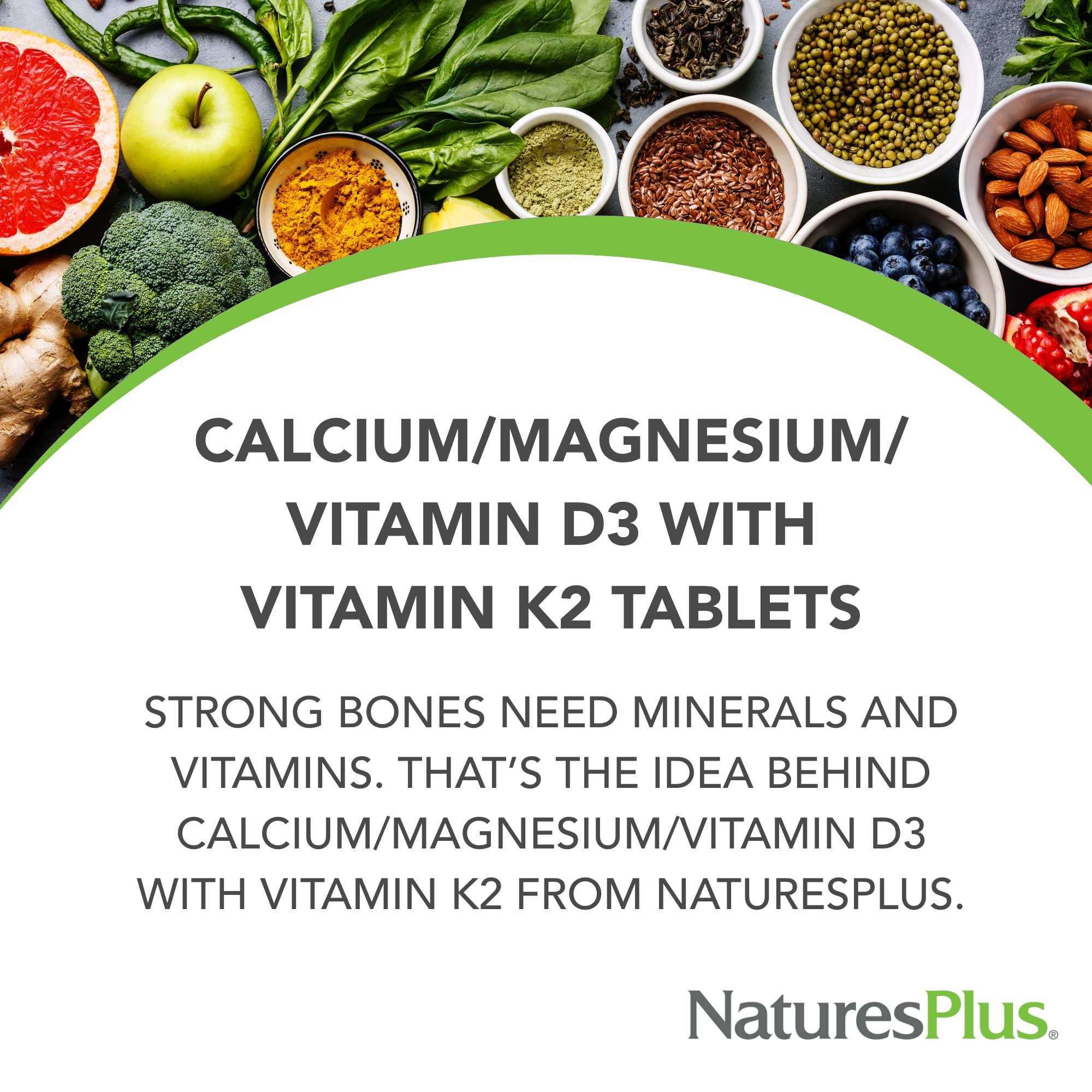 NaturesPlus Cal/Mag/Vit D3 supplement capsules on a wooden table