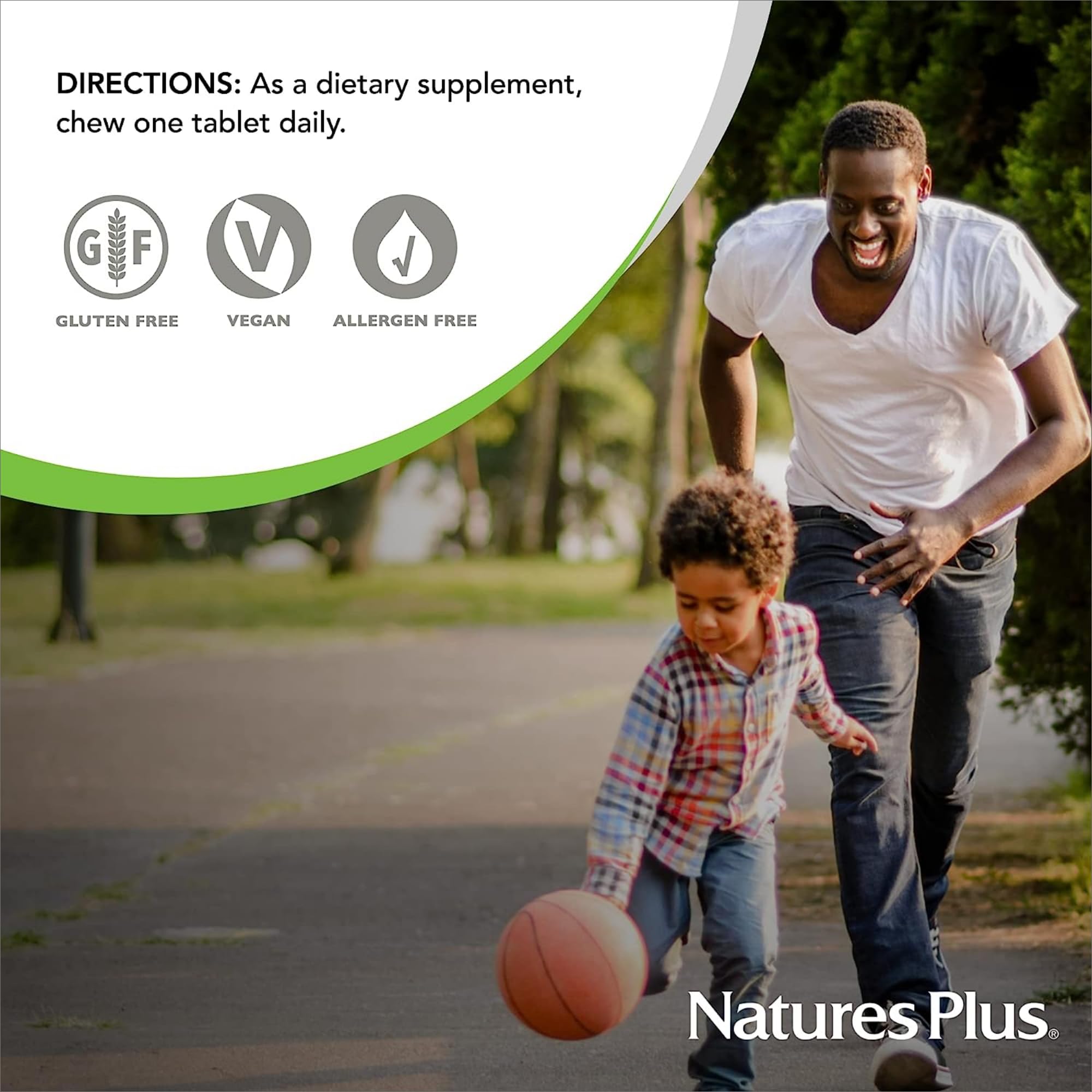 NaturesPlus Chewable Vitamin C 100mg in a child's hand