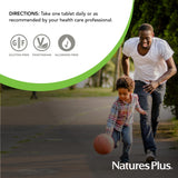 NaturesPlus Gugulipid 1000 mg Extended Release Tablets with a glass of water