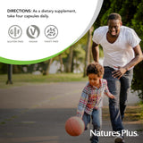 NaturesPlus KalmAssure Magnesium capsules on a wooden table