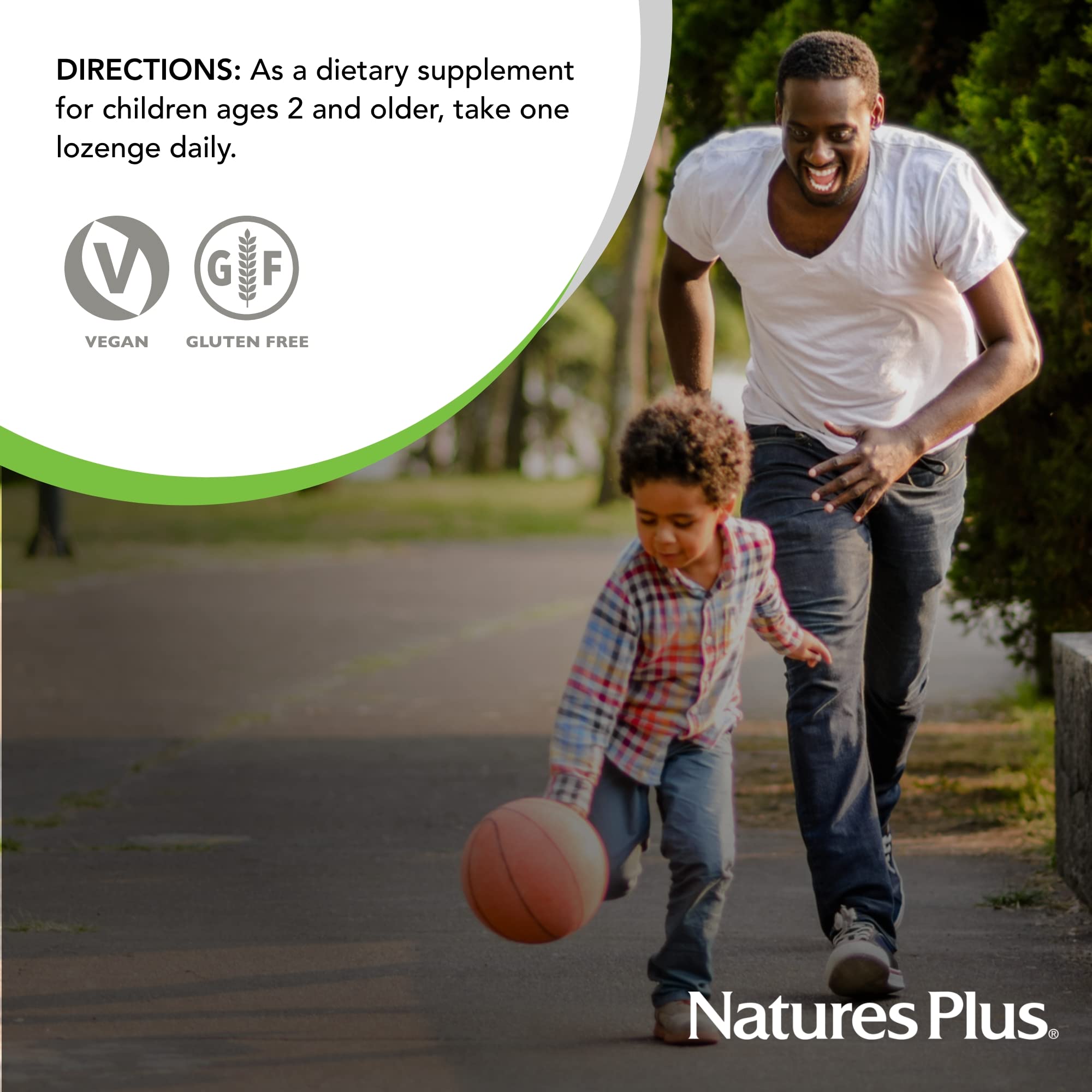 NaturesPlus KidZinc lozenges in a child's hand