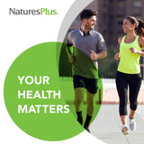 NaturesPlus Mega B-100 B Complex 150g supplement on a table