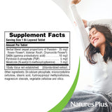NaturesPlus Melatonin 3 mg Tablets with Chamomile on a wooden table