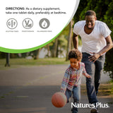 NaturesPlus Red Yeast Rice 600mg tablet on a wooden surface