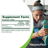 NaturesPlus Vitamin D3 softgels with a measuring spoon