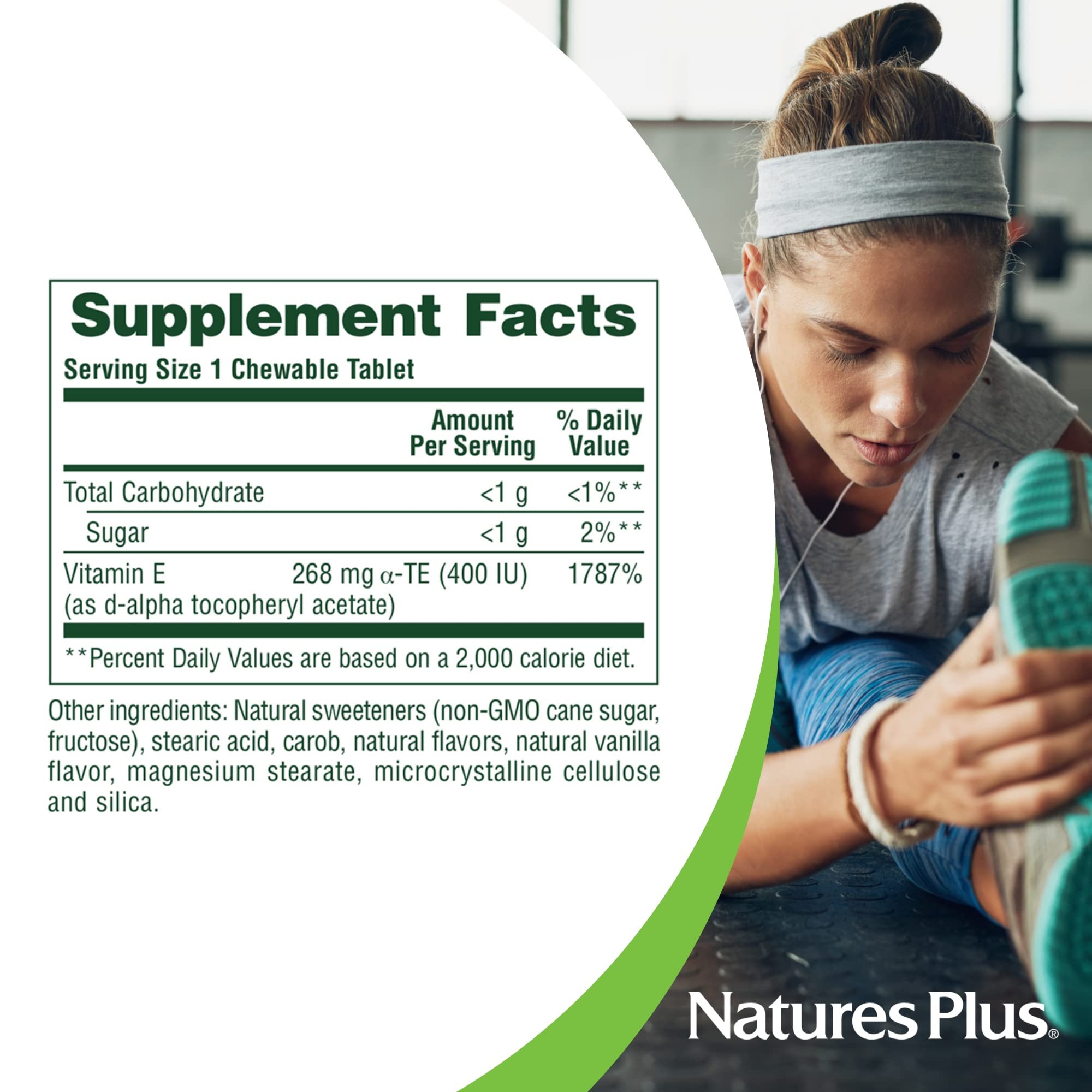 NaturesPlus Vitamin E Chewable tablet on a wooden table