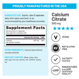 NatureWise Calcium Citrate 500mg vegan capsules on wooden table