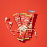 Nello Daily Supplement capsules on a wooden table
