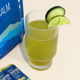 Nello SuperCalm Cucumber Lime powder in a glass