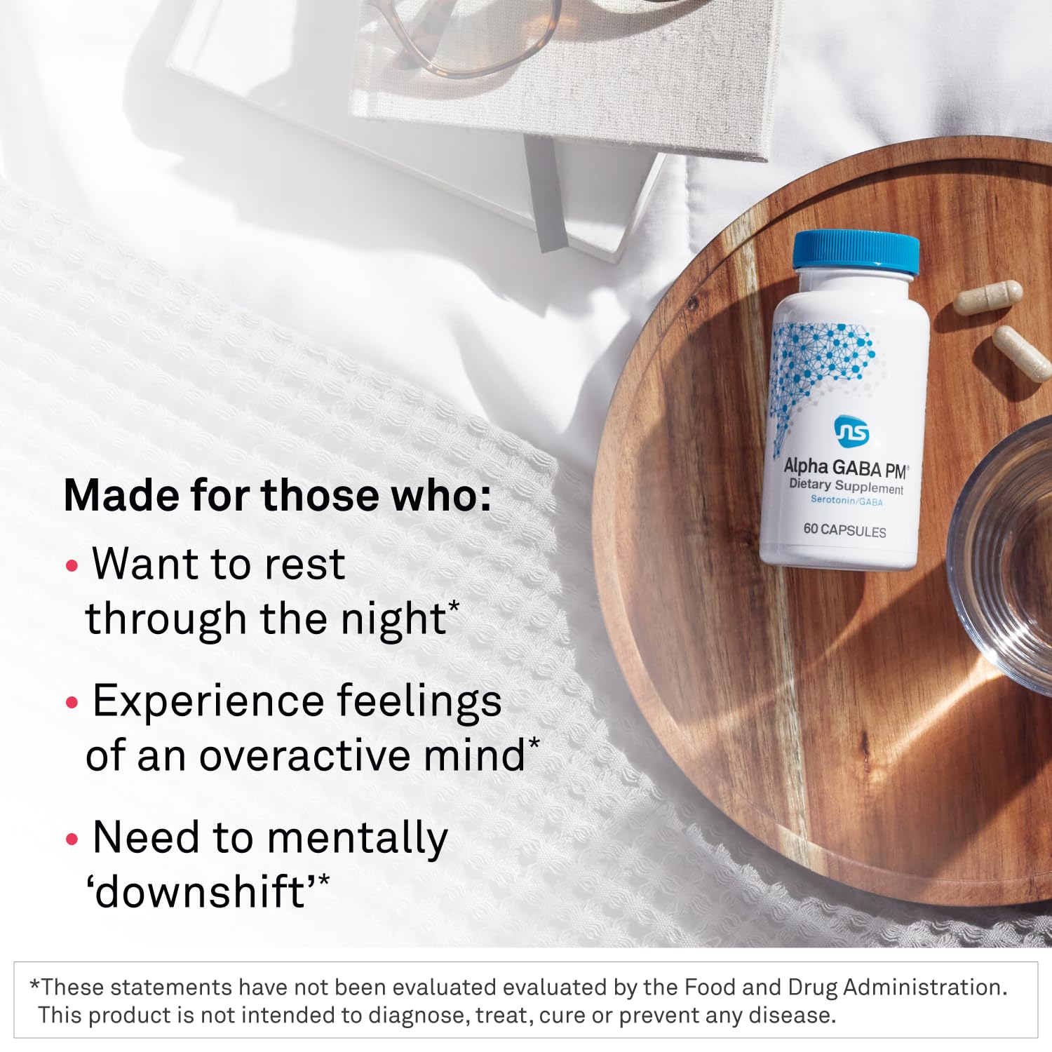NeuroScience Alpha Gaba PM Sleep Supplement packaging on a wooden table