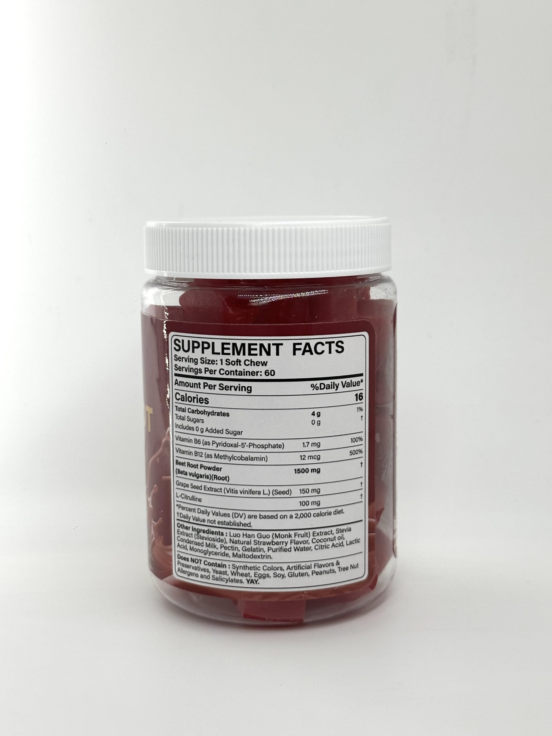 NEVISS Super Beet Chews with a glass of water