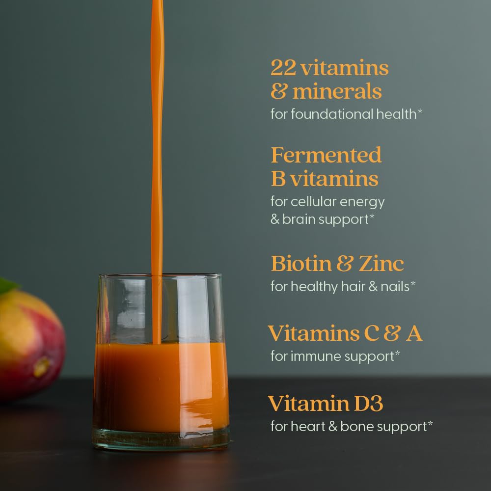 New Chapter Complete Multivitamin Liquid being poured into a glass