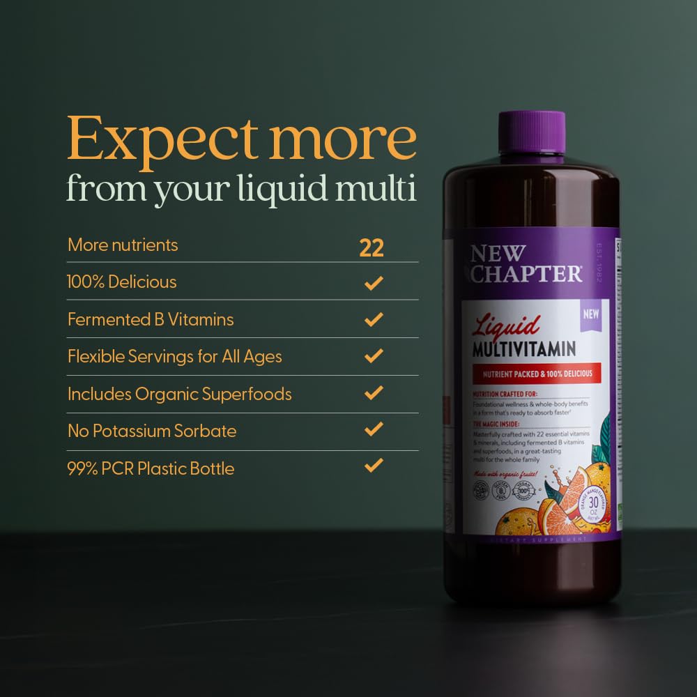 New Chapter Complete Multivitamin Liquid with fresh fruits on a kitchen counter