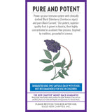 New Chapter Elderberry Force supplement in a hand