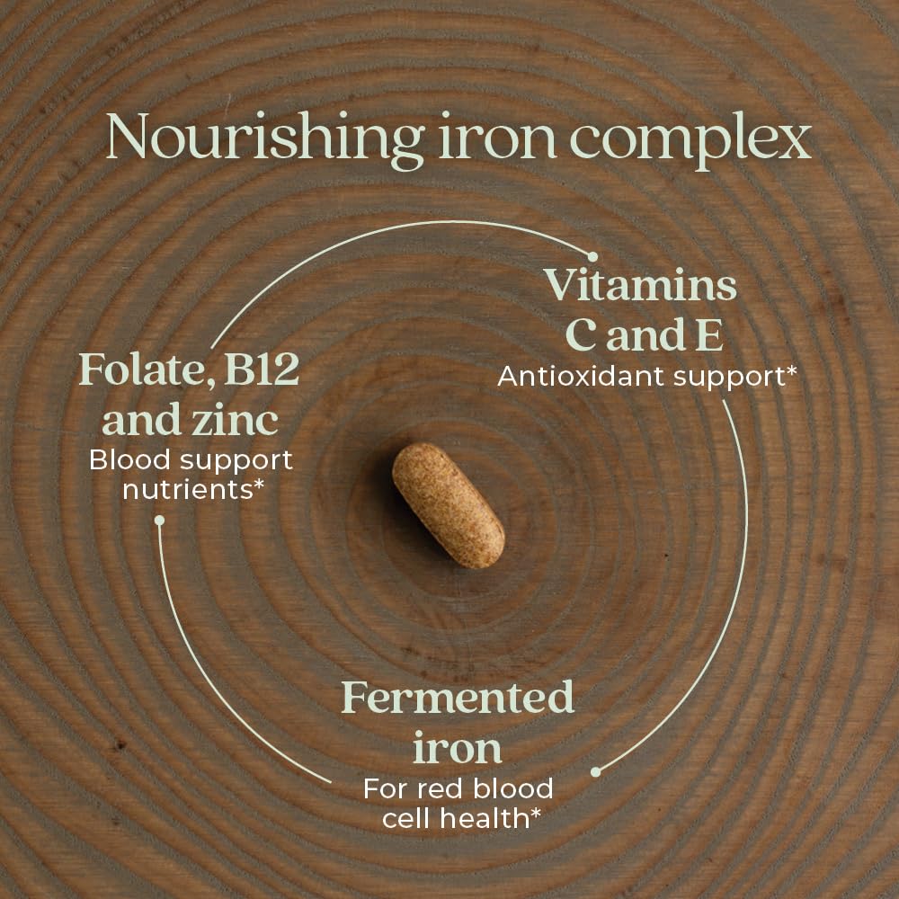 New Chapter Iron+ tablet on a wooden surface