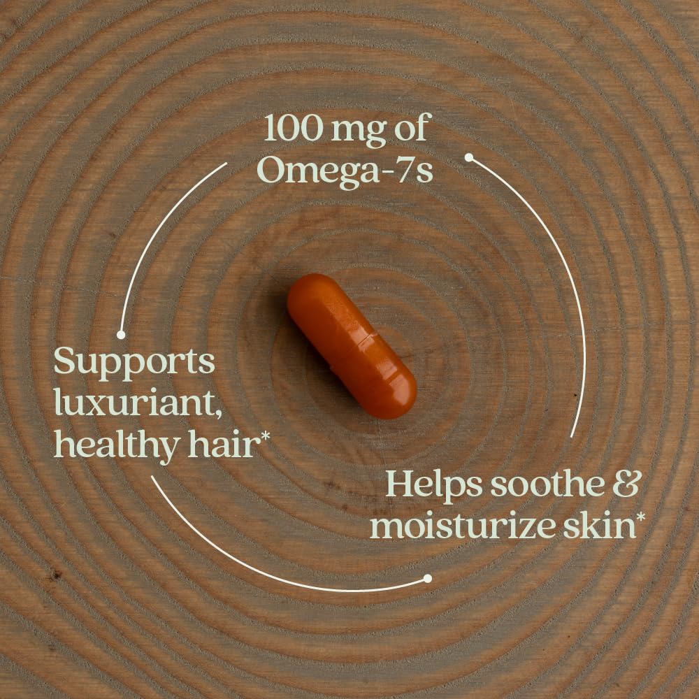 New Chapter Omega-7 Sea Buckthorn Blend capsule in hand