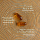 New Chapter Wholemega Fish Oil 2000mg softgels on wooden table