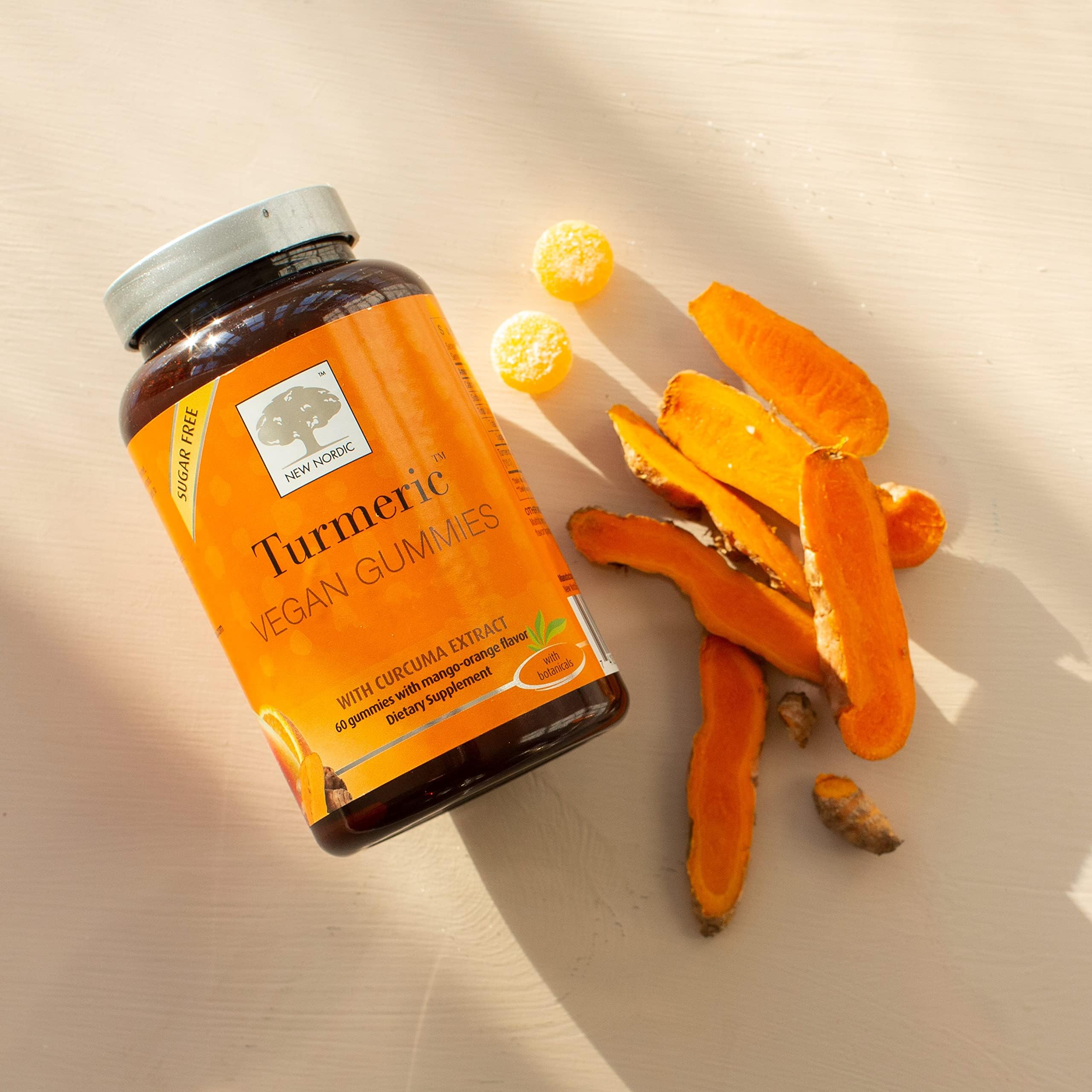 NEW NORDIC Turmeric Gummies on a wooden table