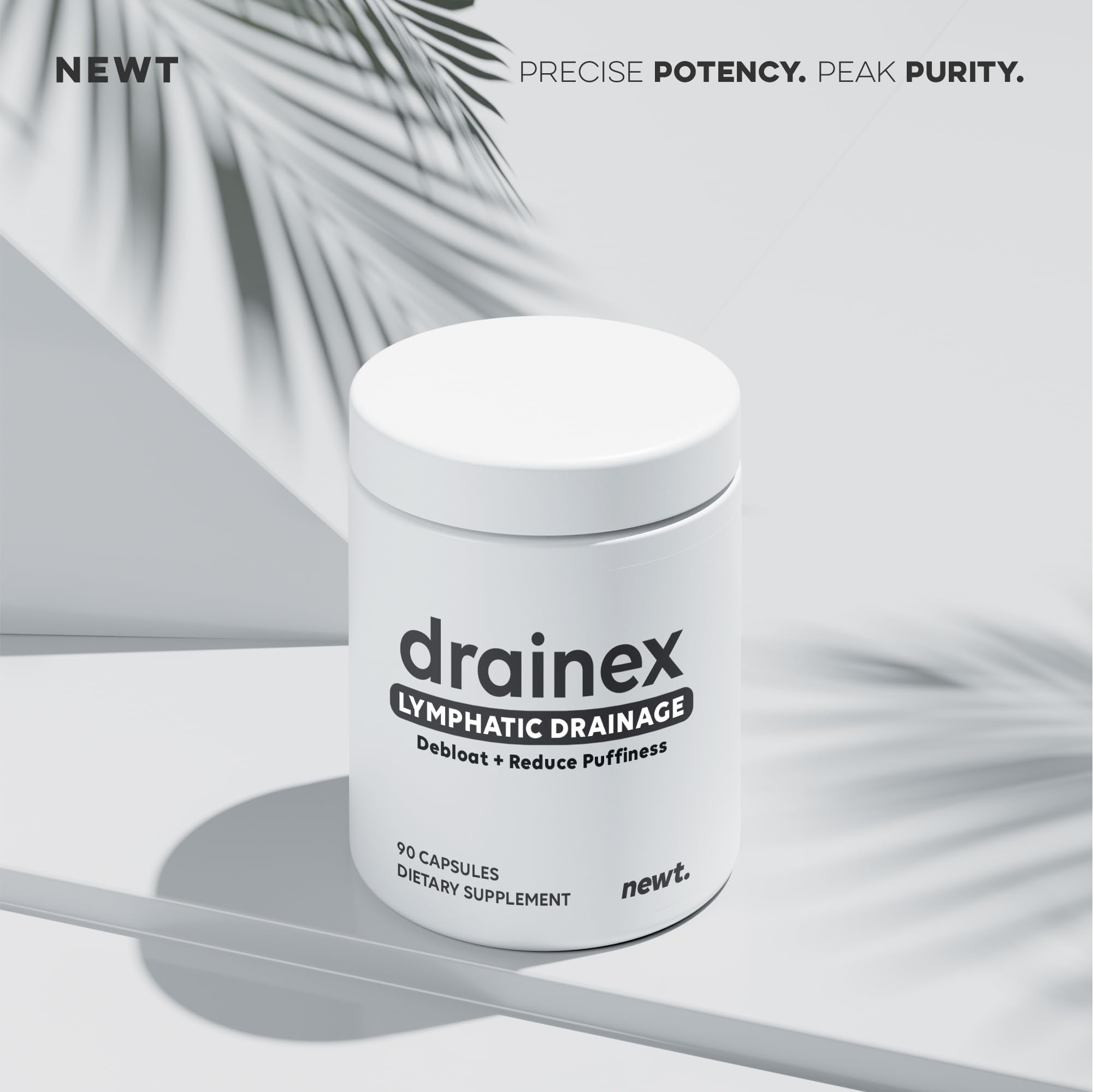 Newt Lymphatic Support Capsules lifestyle scene with water