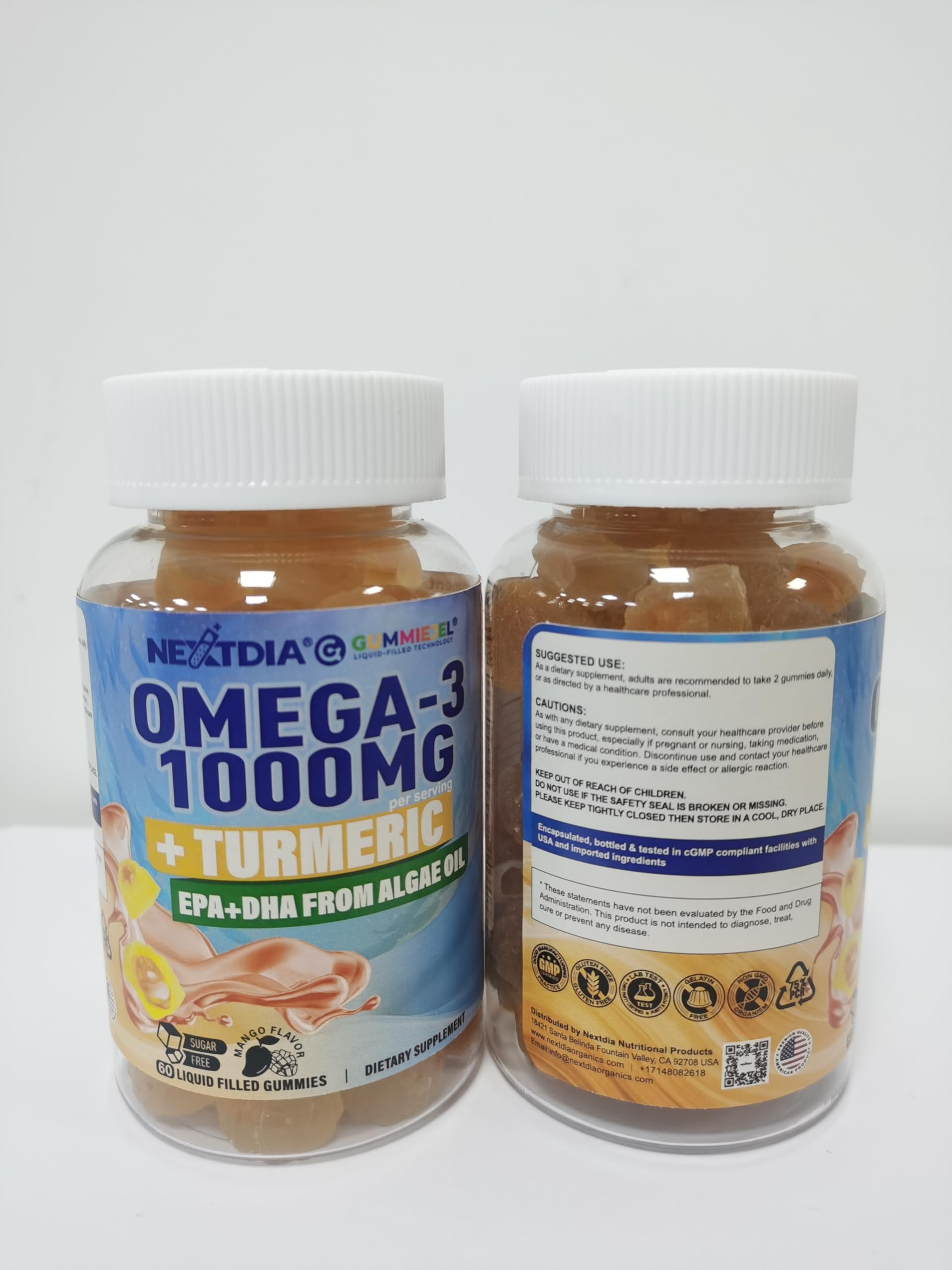 Nextdia Omega-3 Gummies on a wooden table with fresh mango