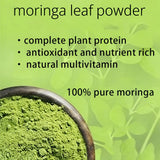 NIVELLE Moringa Capsules on a wooden table with plants