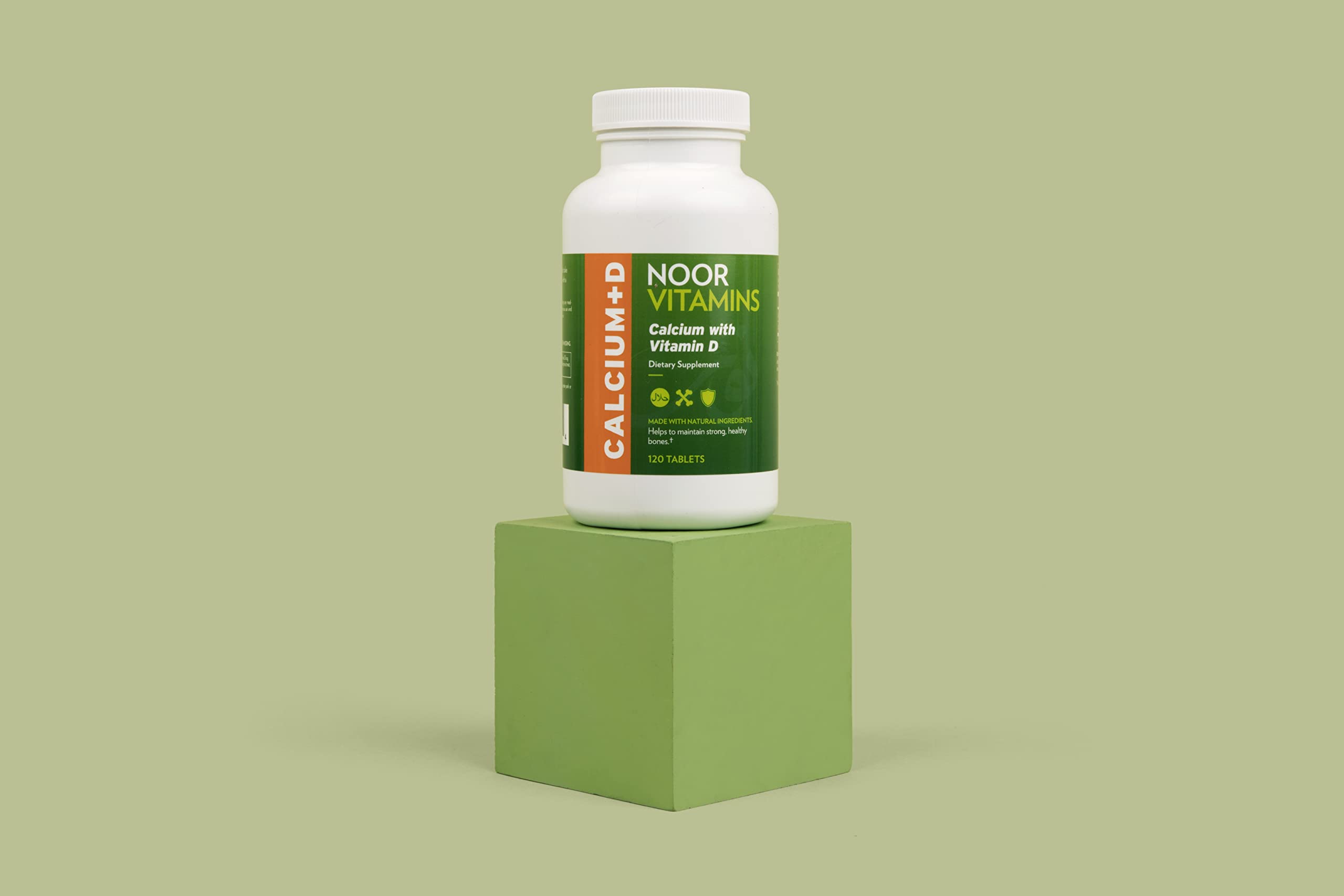 Noor Vitamins Calcium with Vitamin D 1200mg supplement in hand