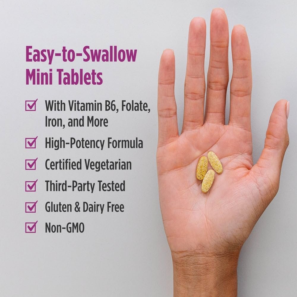 Nordic Naturals Prenatal Multivitamin Mini Tablets with a measuring spoon