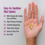 Nordic Naturals Prenatal Multivitamin Mini Tablets with a measuring spoon