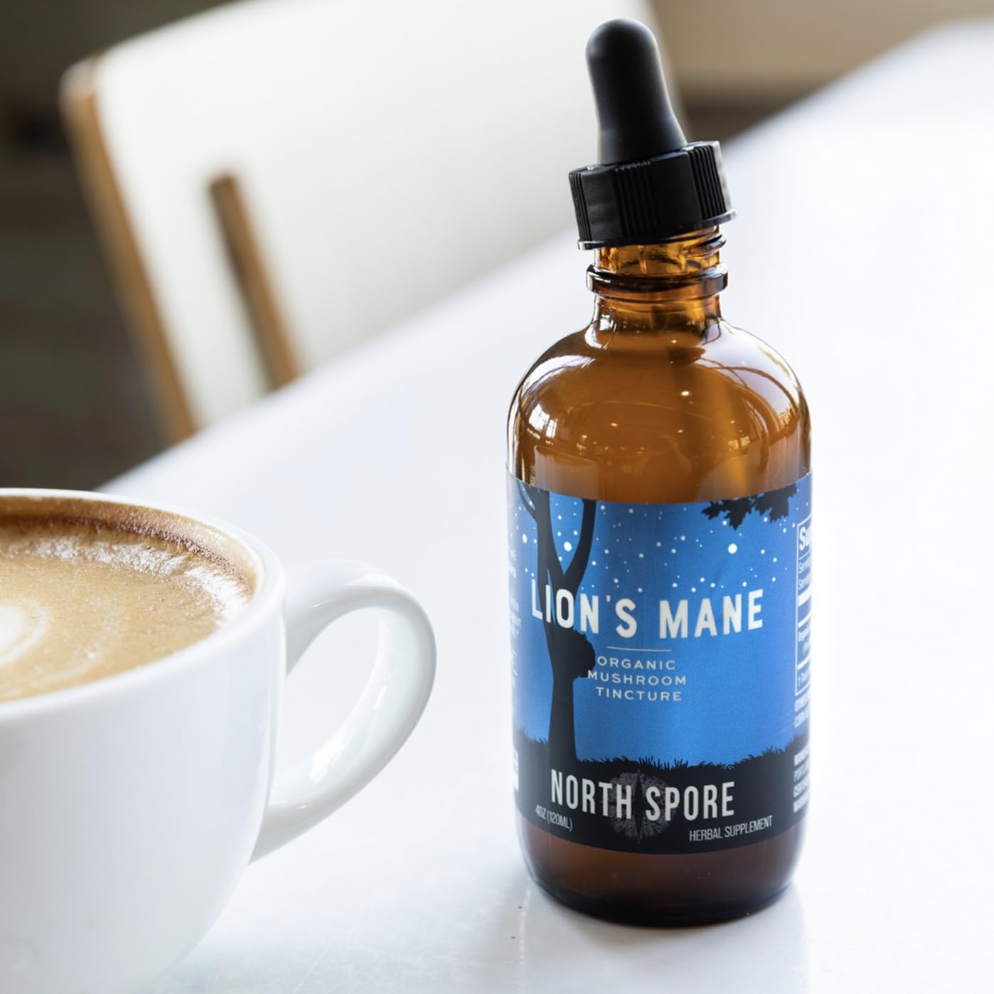 North Spore Lion's Mane Mushroom Extract 4oz liquid tincture in a lifestyle setting