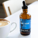 North Spore Lion's Mane Mushroom Extract 4oz liquid tincture in a lifestyle setting