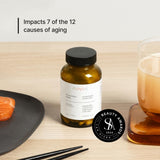 Novos NMN Supplement 250mg capsules on a wooden surface