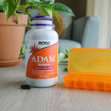 NOW Foods Adam quality Men's Multi Vitamin Softgels on a wooden table