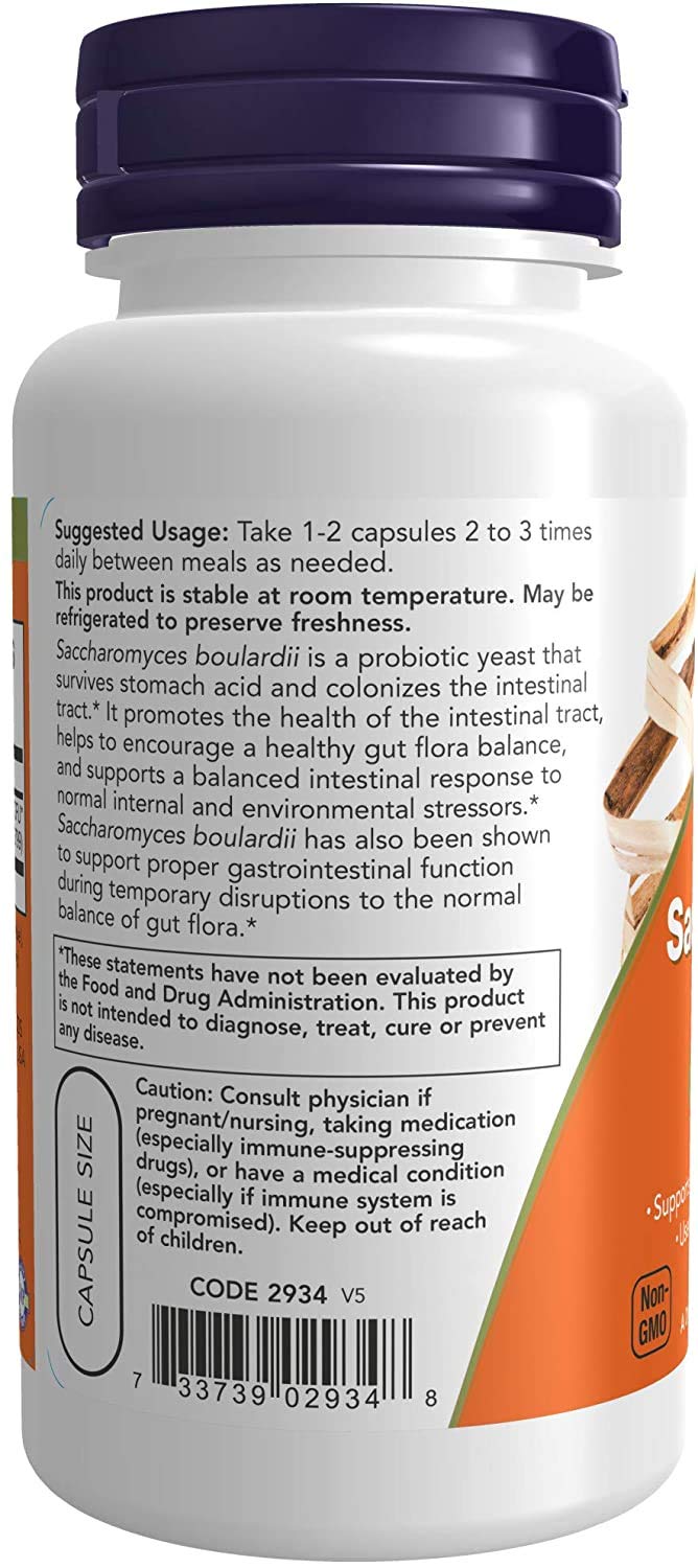 NOW Foods Saccharomyces Boulardii capsules on a wooden surface