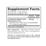 NusaPure Black Seed Oil 450mg capsules on a wooden table