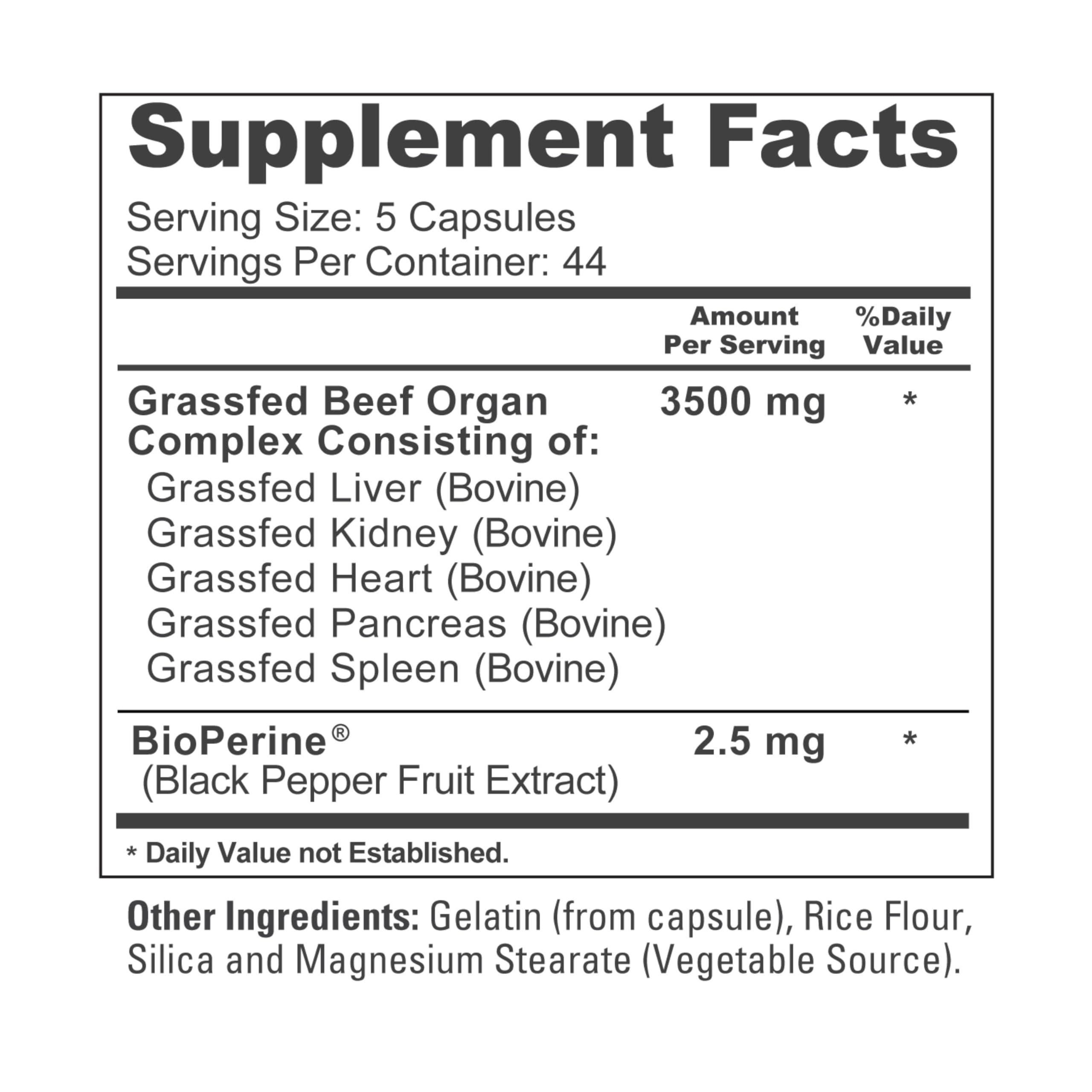 NusaPure Grass Fed Beef Organ Complex capsules in a hand
