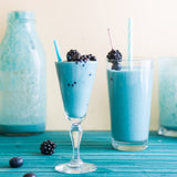 Nut milks prepared with blue spirulina powder