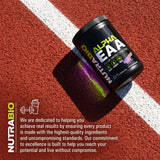 NutraBio Alpha EAA Powder 453g mixed in a glass of water